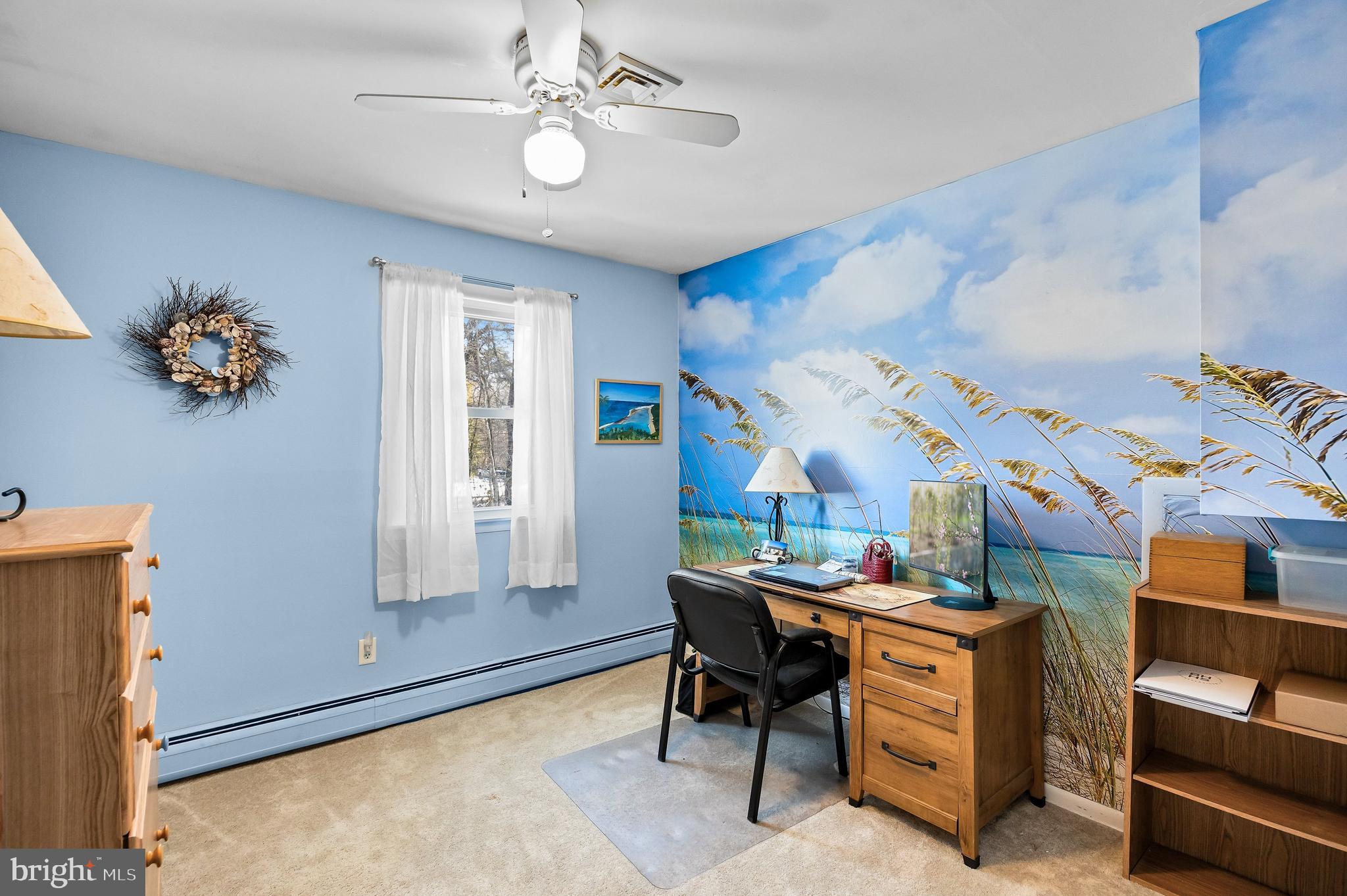 405 New Road Southampton, NJ 08088 - Photo 25 of 39 a room with furniture a chandelier and a window