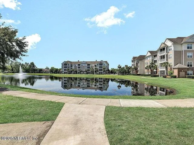 a view of a lake with houses