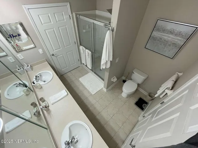 a view of living room with furniture and a rug