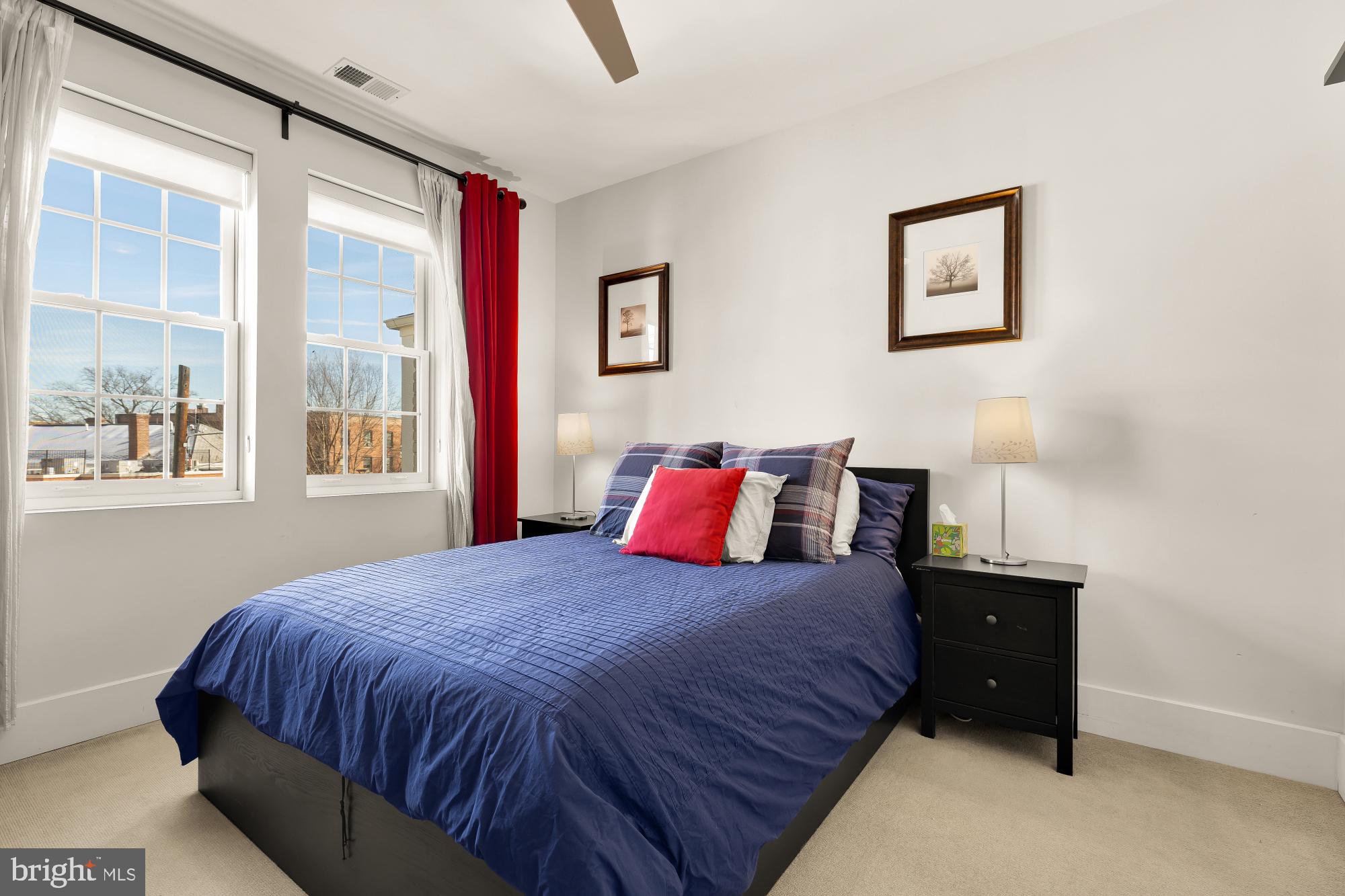 2926 Porter Street Northwest, Unit 306 Washington, DC 20008 - Photo 8 of 19 a bedroom with a bed and a window