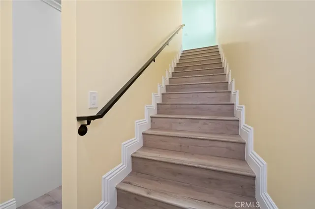 a bathroom with a sink toilet vanity and shower