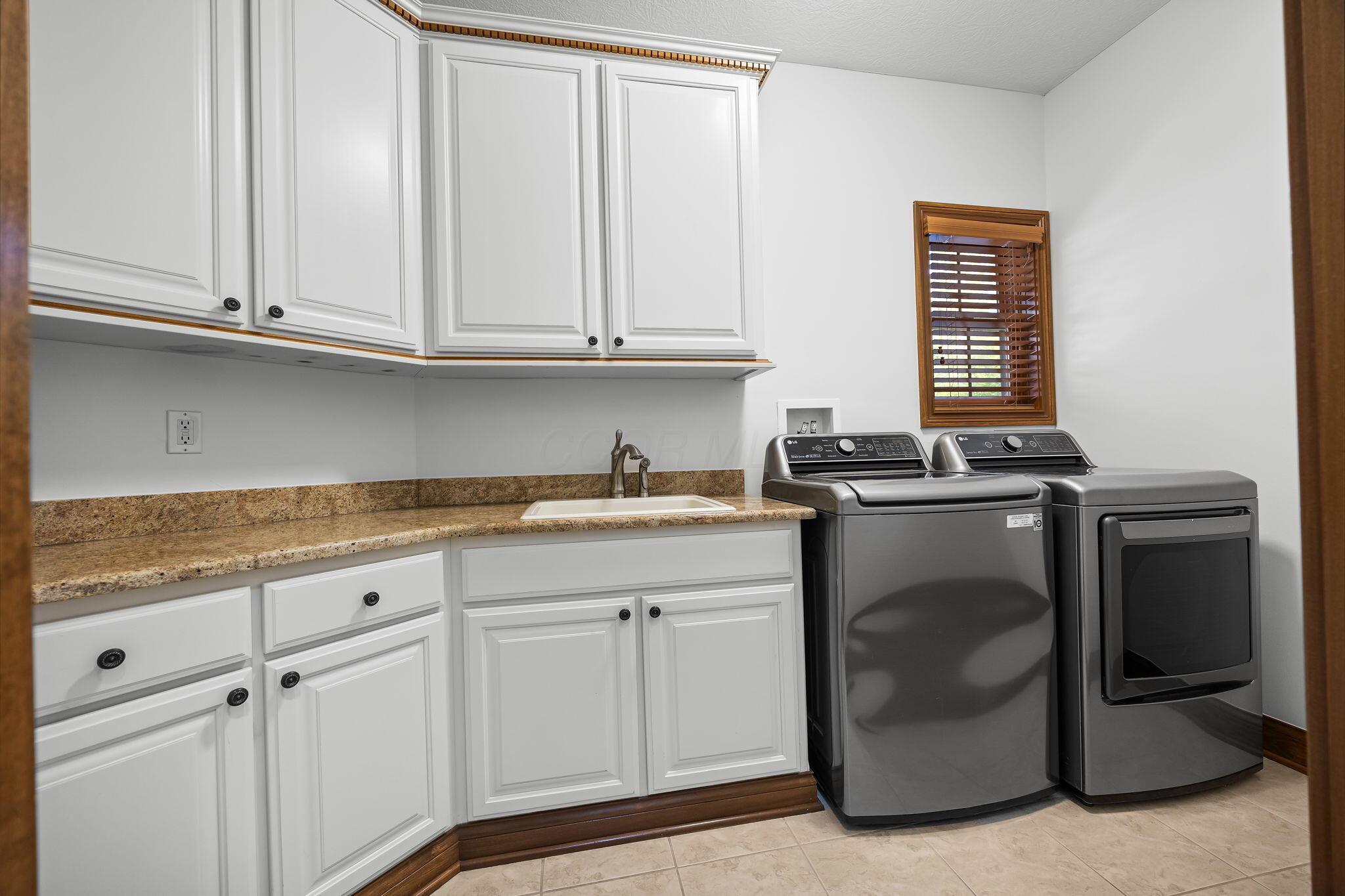 8312 Steitz Road Powell, OH 43065 - Photo 46 of 78 first floor laundry room