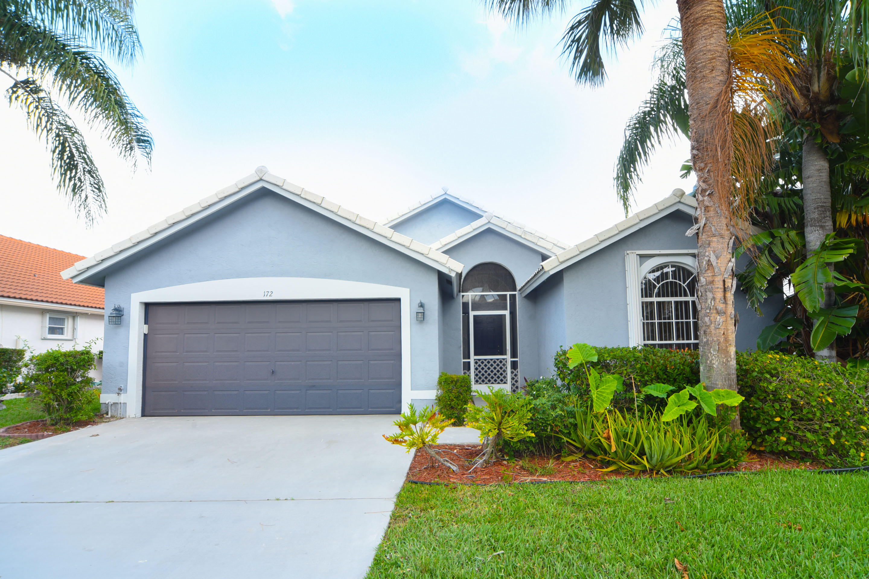 172 Cove Road Greenacres, FL 33413 - Photo 5 of 39 COVE EXT FRONT