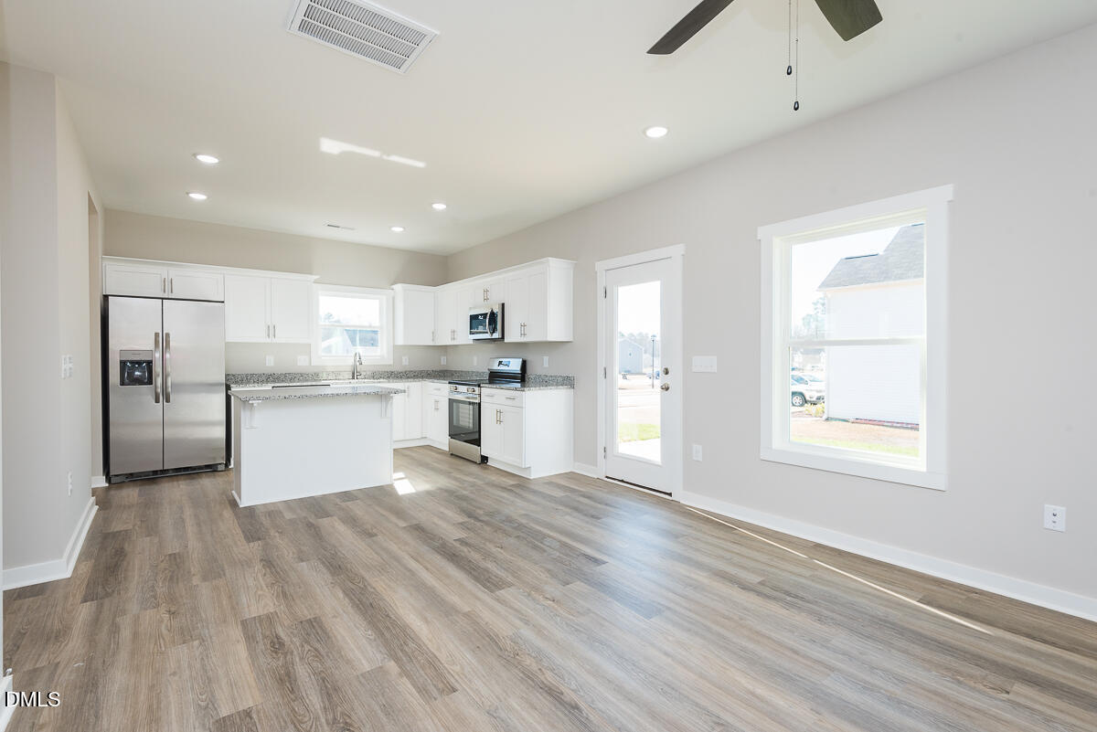 2823 Ricolden Trail Elon, NC 27244 - Photo 11 of 26 a view of kitchen with wooden floor