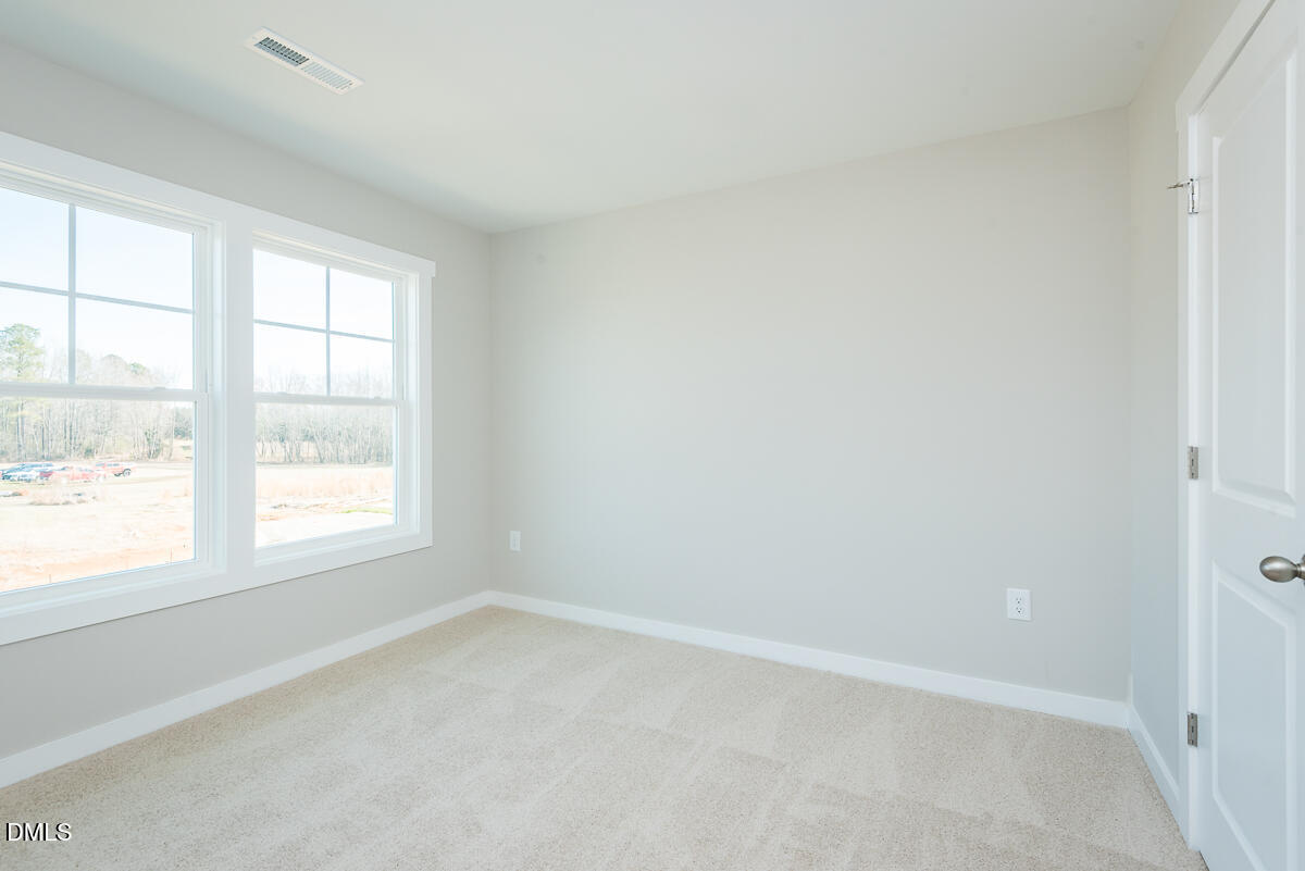 2823 Ricolden Trail Elon, NC 27244 - Photo 16 of 26 an empty room with a window