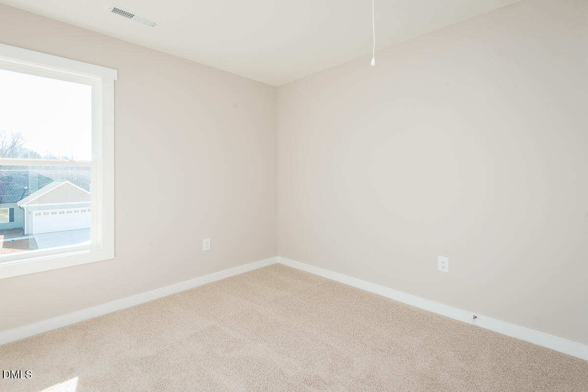 2823 Ricolden Trail Elon, NC 27244 - Photo 18 of 26 an empty room with a window