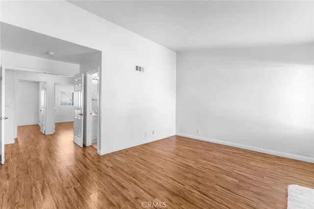 a view of a pathway both side of house