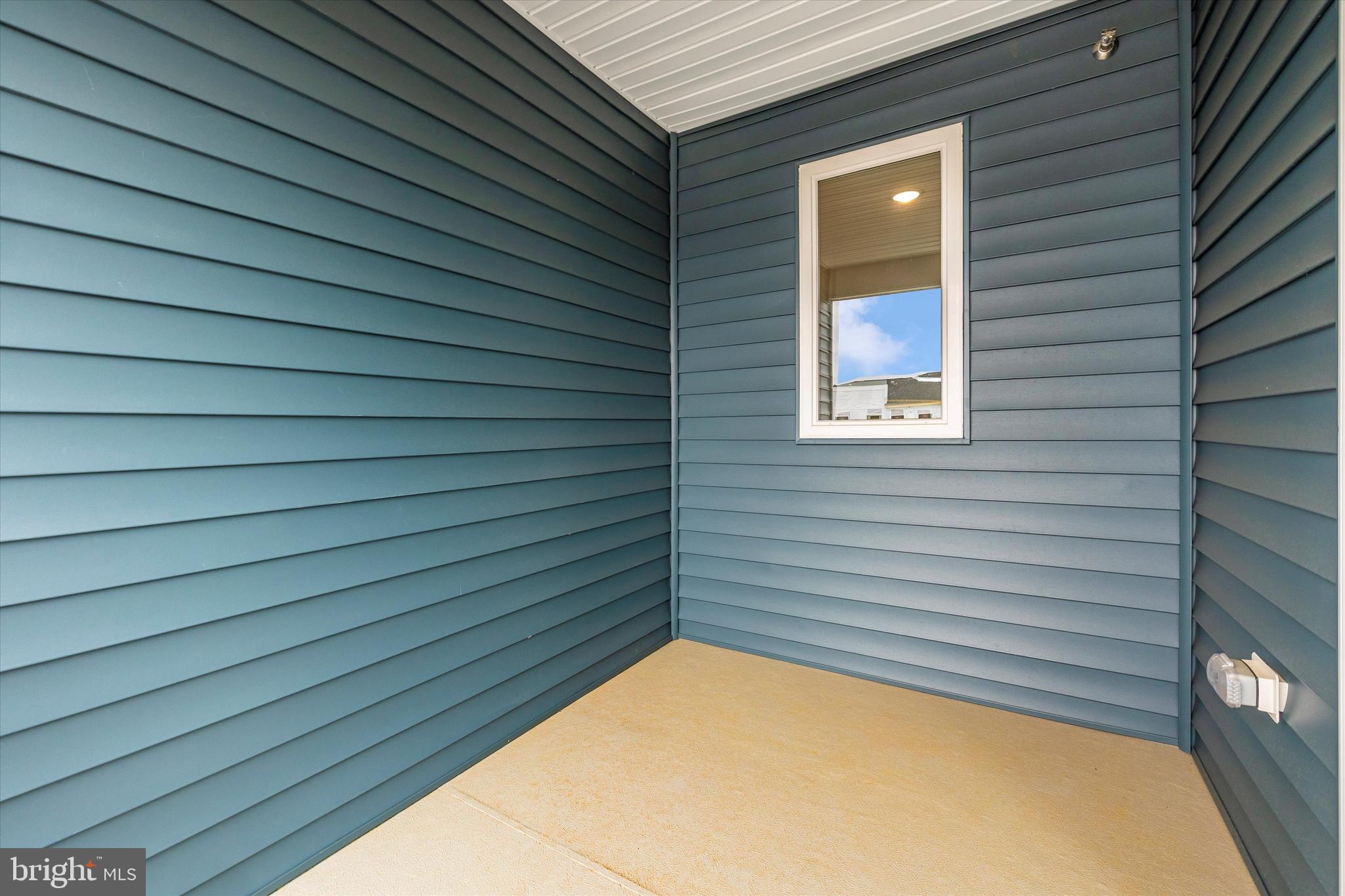 720 Iron Frg Road, Unit A Frederick, MD 21702 - Photo 32 of 44 Private covered terrace off primary bedroom.