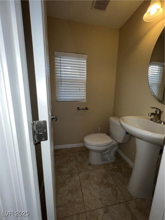 6592 Benvolio Court Las Vegas, NV 89141 - Photo 18 of 27 Bathroom with toilet and light tile patterned floors