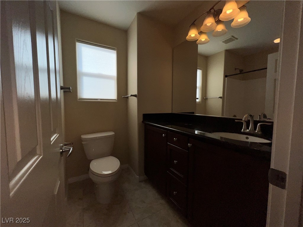 6592 Benvolio Court Las Vegas, NV 89141 - Photo 7 of 27 Full bathroom with vanity and a shower