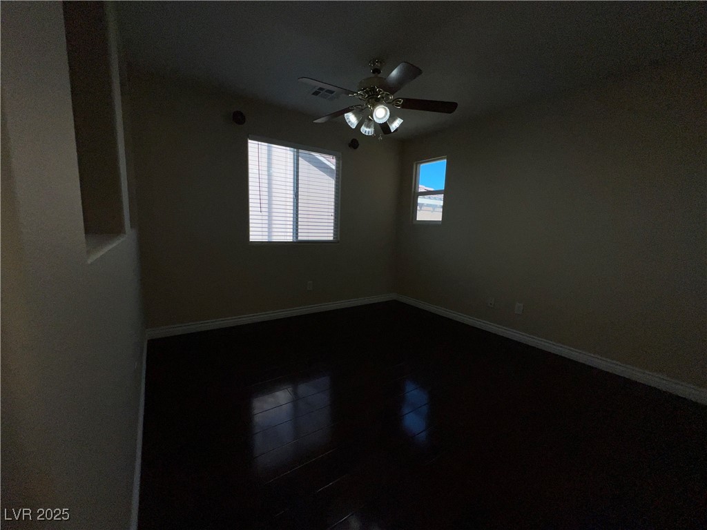 6592 Benvolio Court Las Vegas, NV 89141 - Photo 9 of 27 Unfurnished room with baseboards and ceiling fan