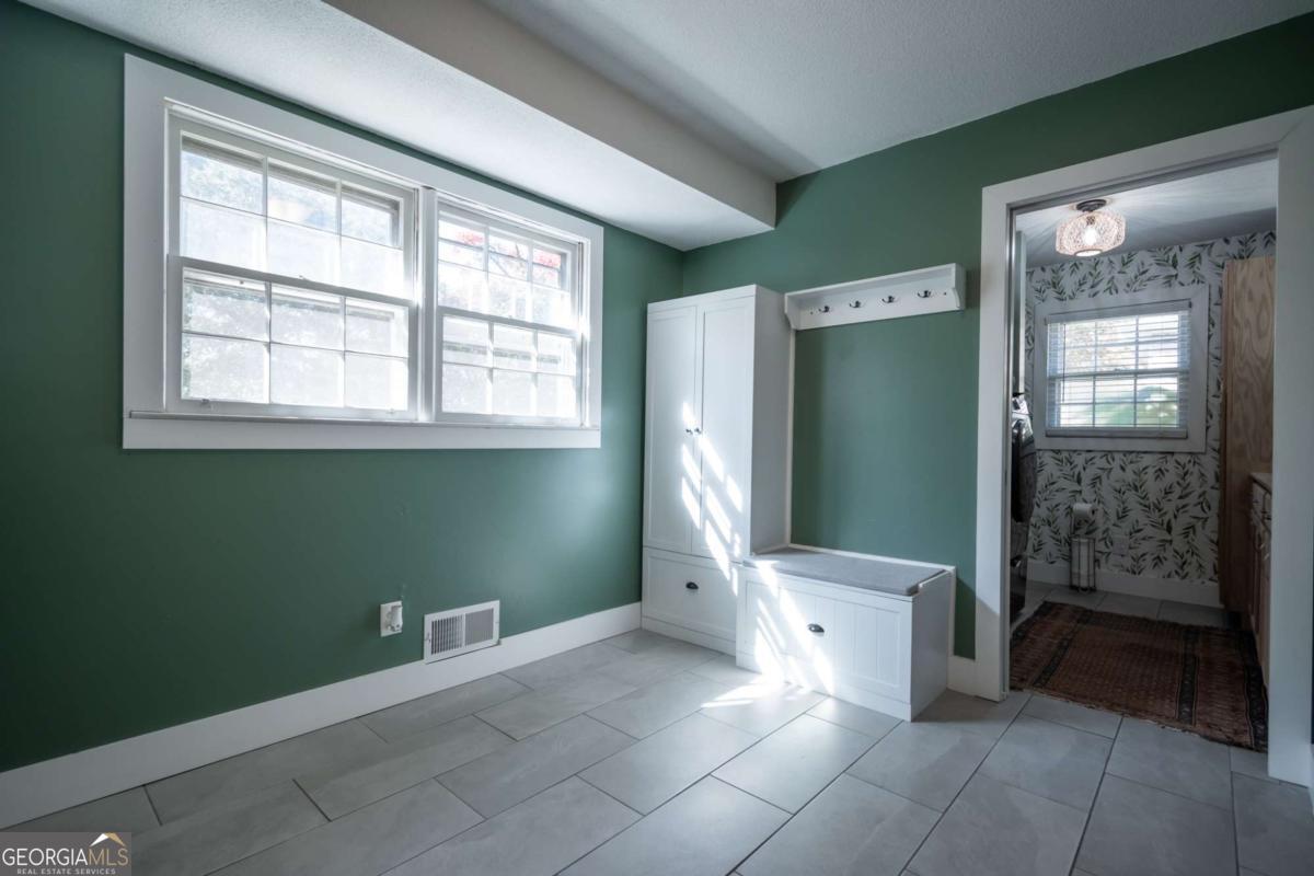 135 Tara Way Athens, GA 30606 - Photo 12 of 36 an empty room with closet and windows