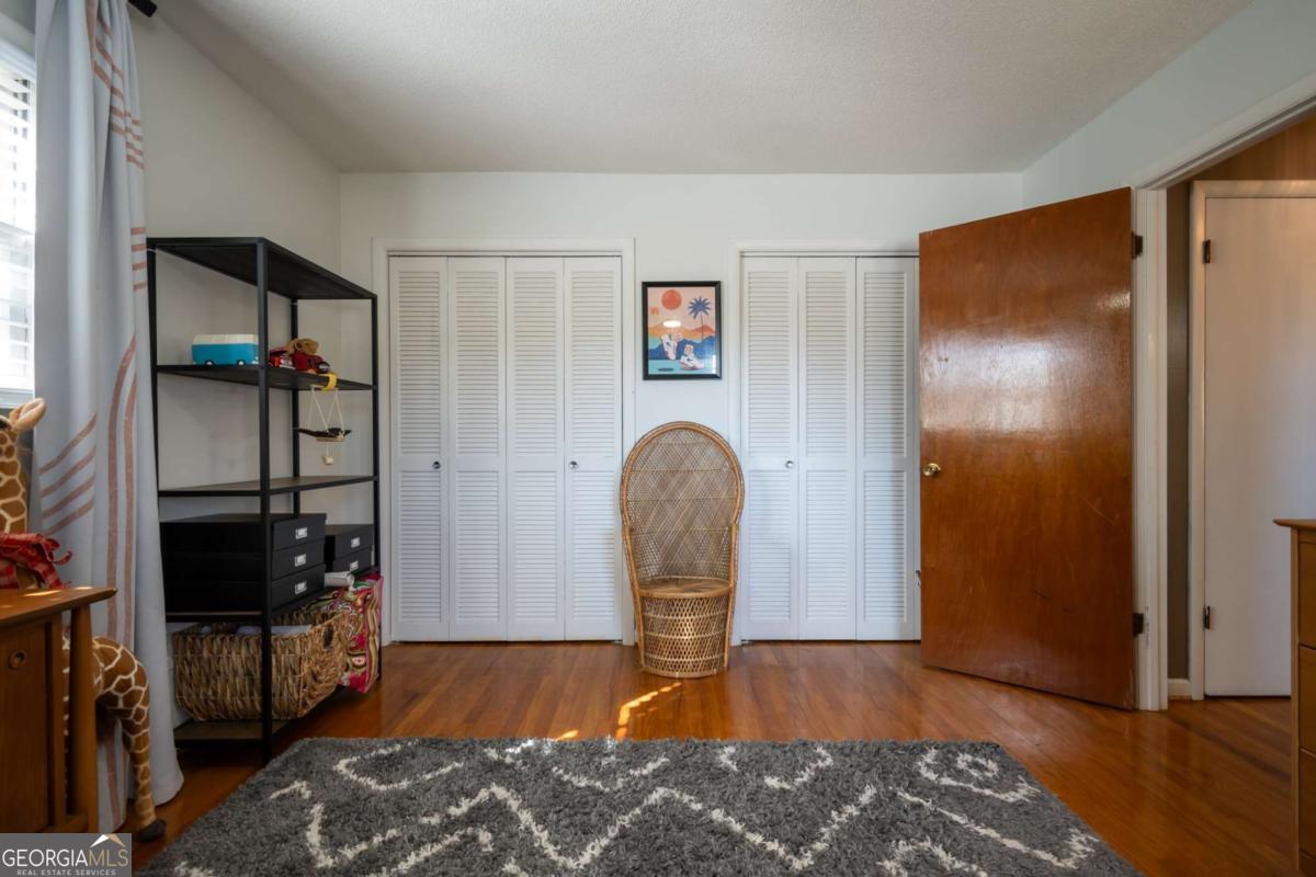 135 Tara Way Athens, GA 30606 - Photo 27 of 36 a bedroom with bed and a window