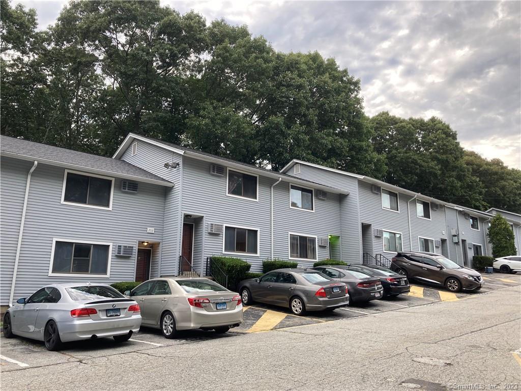292 Meridian Street, Unit J Groton, CT 06340 - Photo 1 of 1 a view of a car parked in front of house
