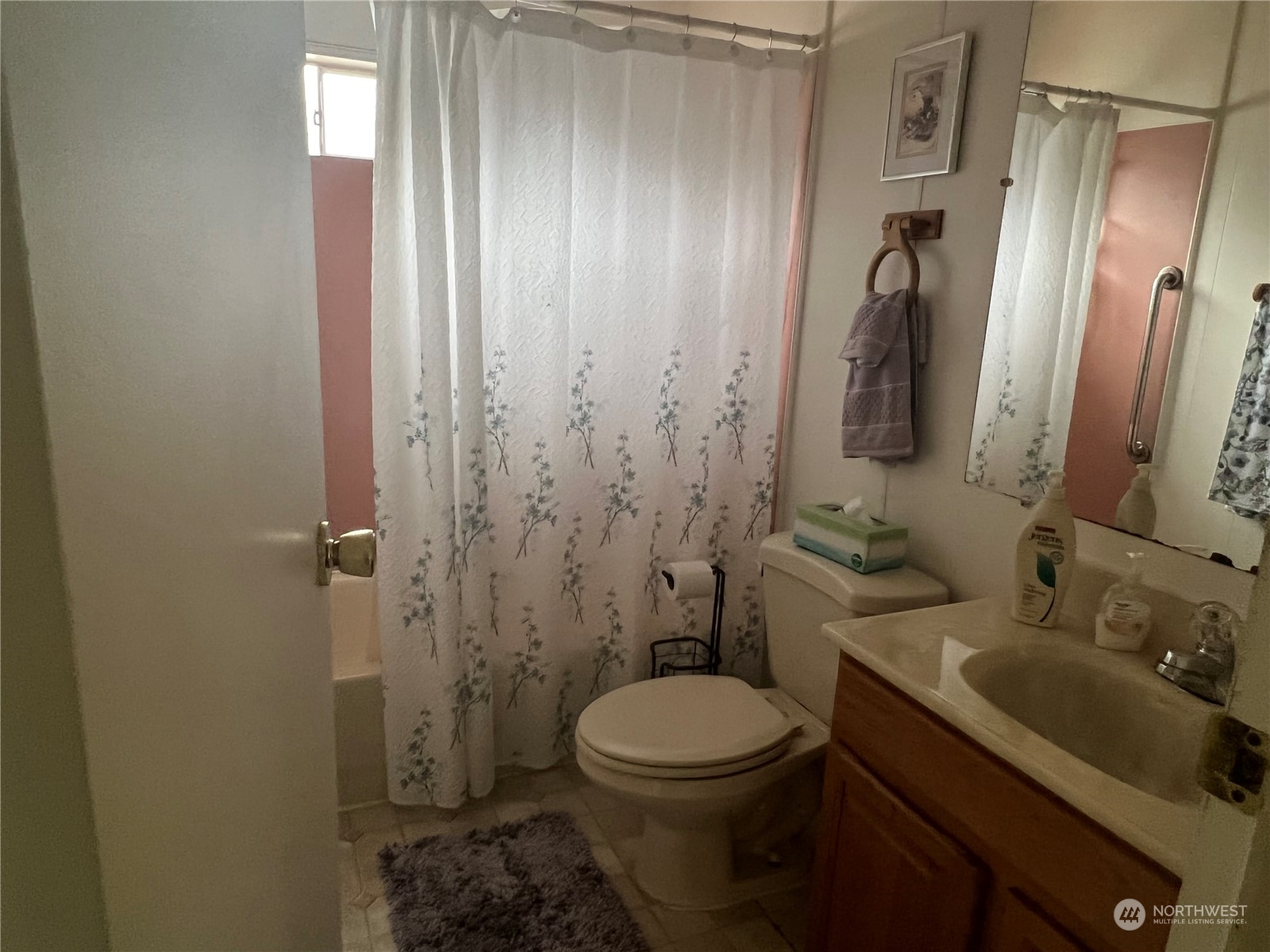 11622 Silver Lake Road, Unit 55 Everett, WA 98208 - Photo 13 of 17 a bathroom with a sink toilet and shower