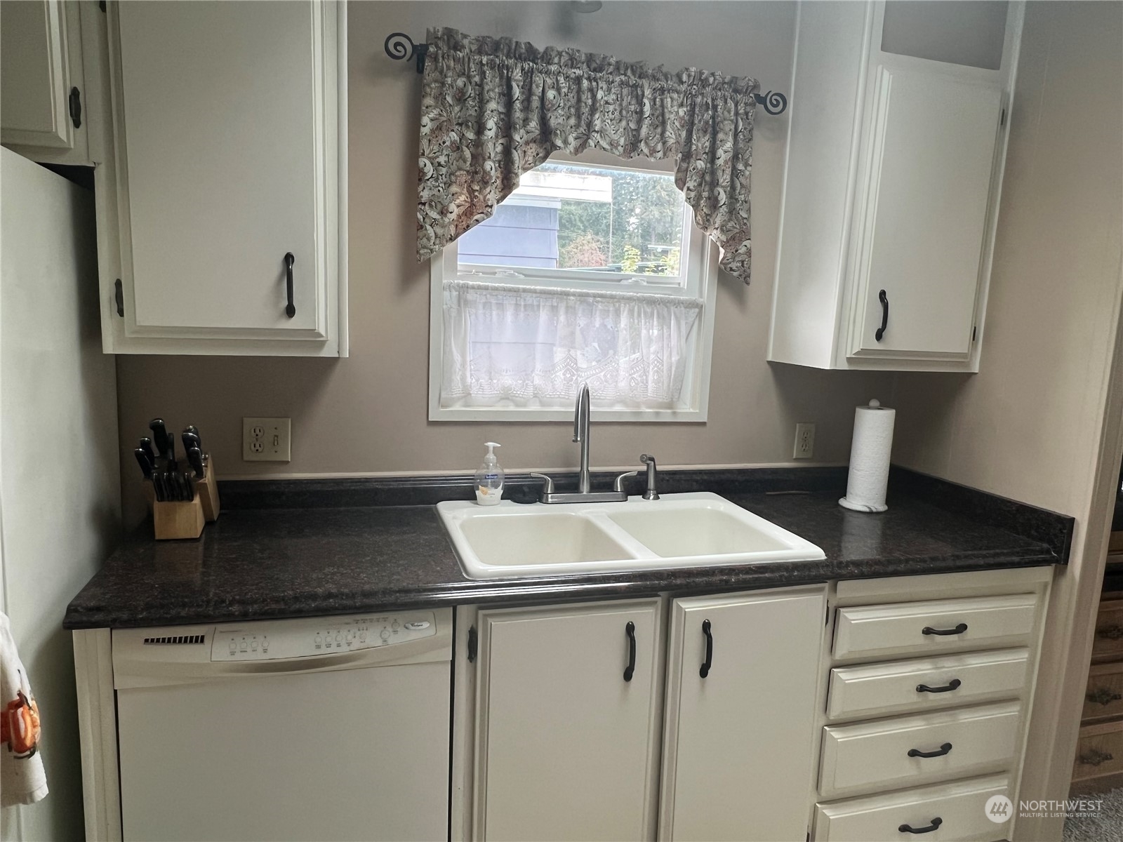 11622 Silver Lake Road, Unit 55 Everett, WA 98208 - Photo 16 of 17 a view of a sink a mirror and cabinets