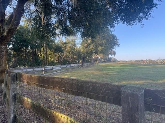 Tbd Northwest 100th Street Ocala, FL 34475 - Photo 11 of 12 a view of a field with an trees