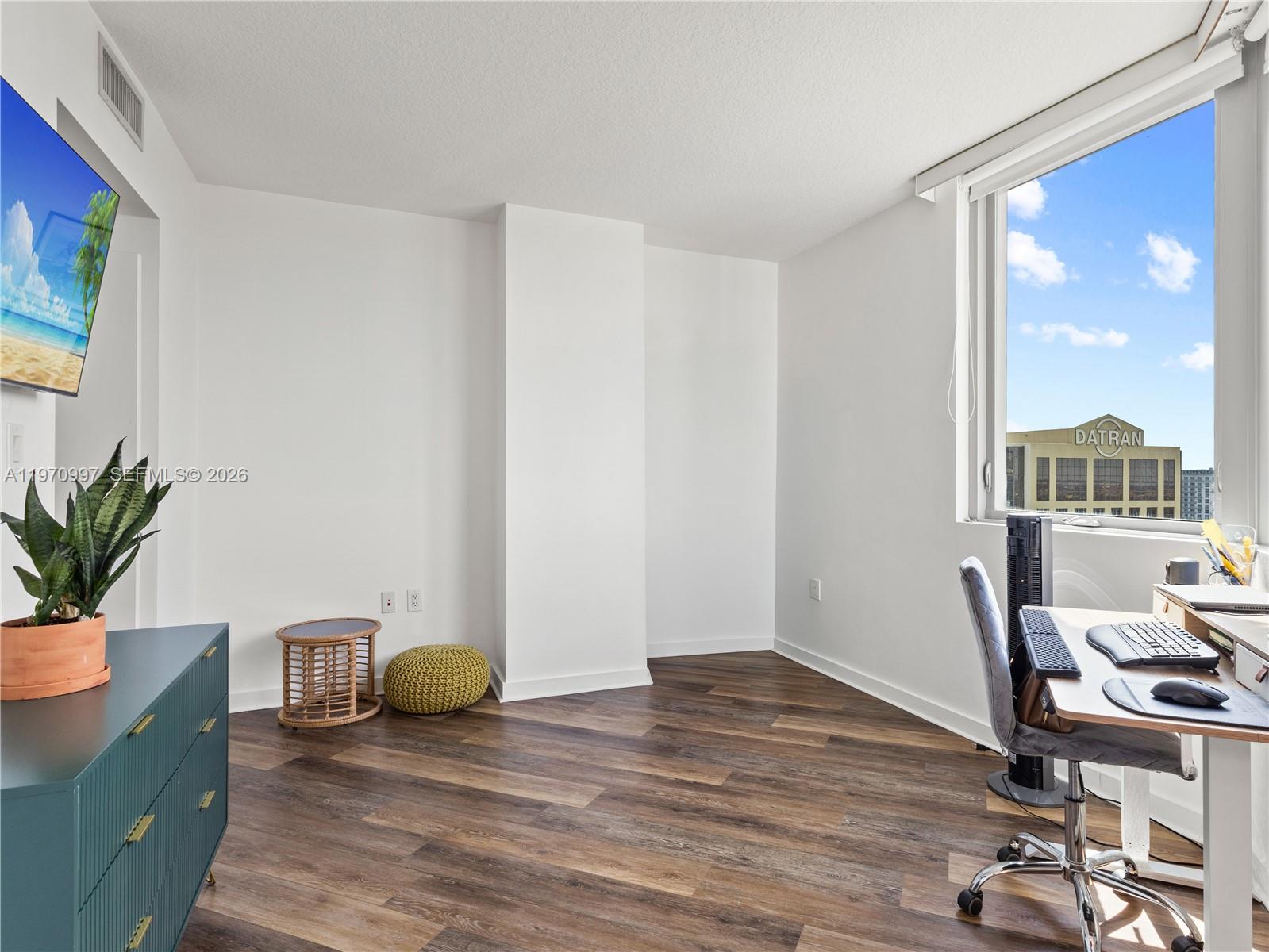 9066 Southwest 73rd Court, Unit 2008 Miami, FL 33156 - Photo 20 of 35 a workspace with furniture and window