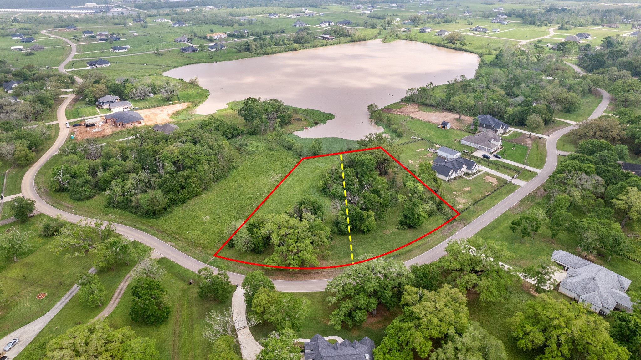 21610 Chenango Lake Drive Angleton, TX 77515 - Photo 1 of 21 an aerial view of a garden