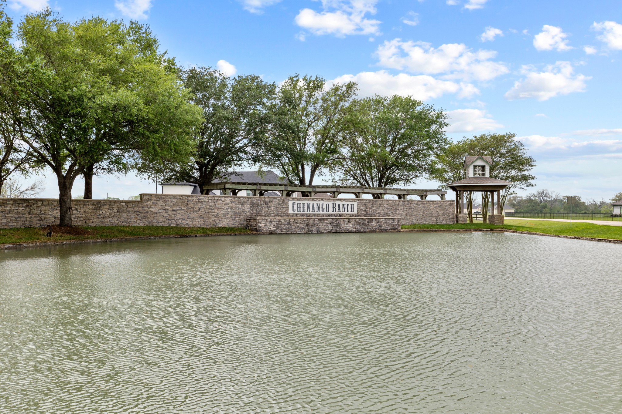 21610 Chenango Lake Drive Angleton, TX 77515 - Photo 20 of 21 a view of a swimming pool with an outdoor space and seating area