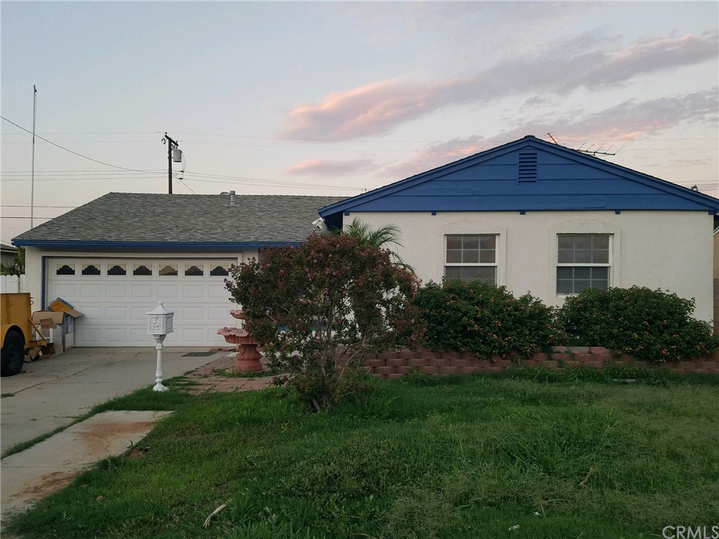5245 Rutland Avenue Riverside, CA 92503 - Photo 1 of 1 a front view of house with a garden
