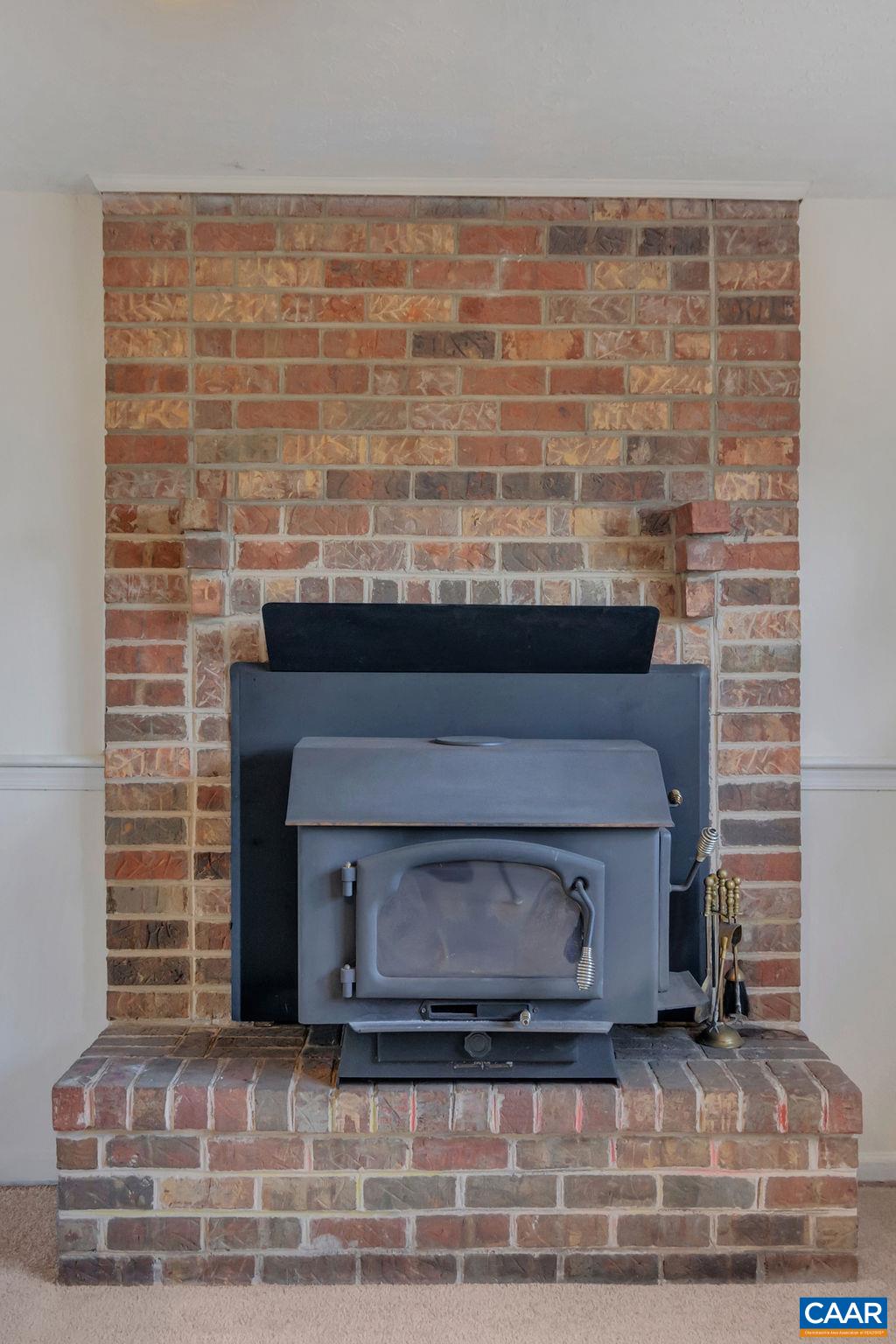 385 Gillums Ridge Road Charlottesville, VA 22903 - Photo 18 of 34 a fireplace
