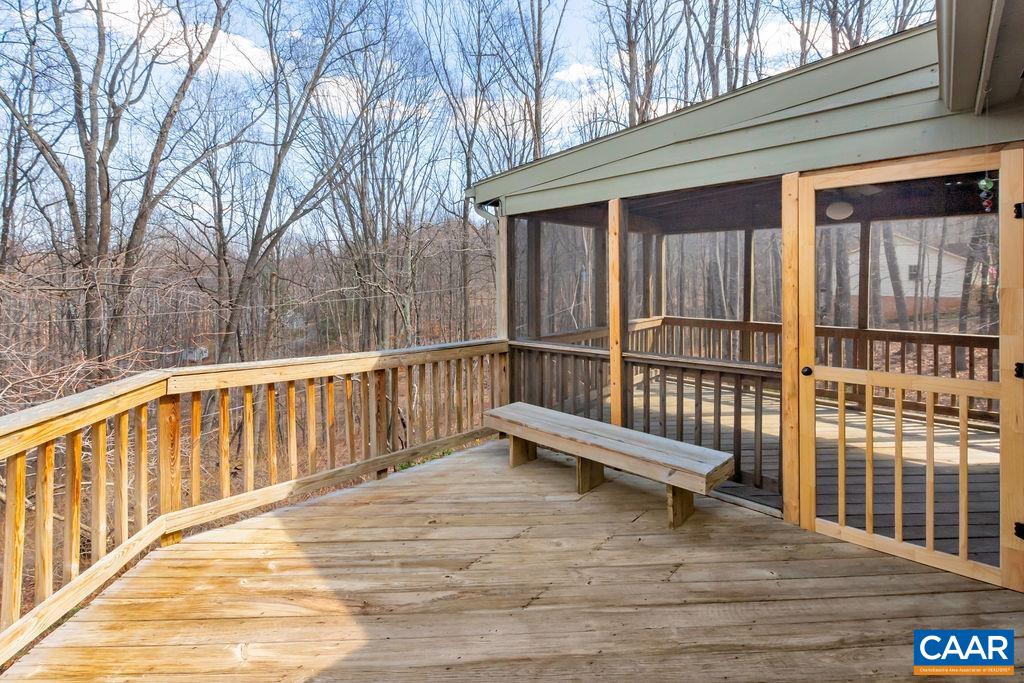 385 Gillums Ridge Road Charlottesville, VA 22903 - Photo 27 of 34 a view of a wooden deck