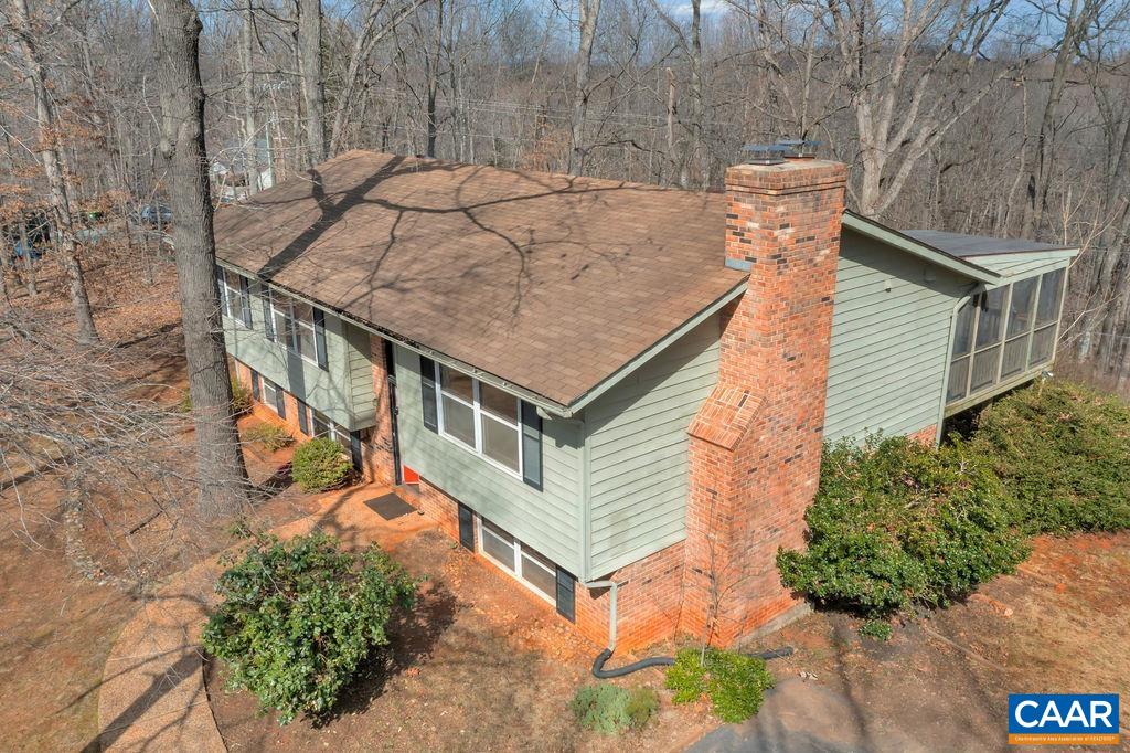 385 Gillums Ridge Road Charlottesville, VA 22903 - Photo 28 of 34 front view of a house with a yard