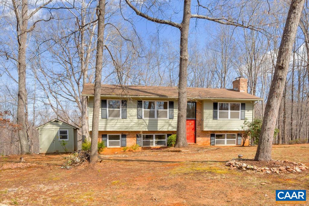 385 Gillums Ridge Road Charlottesville, VA 22903 - Photo 34 of 34 a front view of a house with a yard