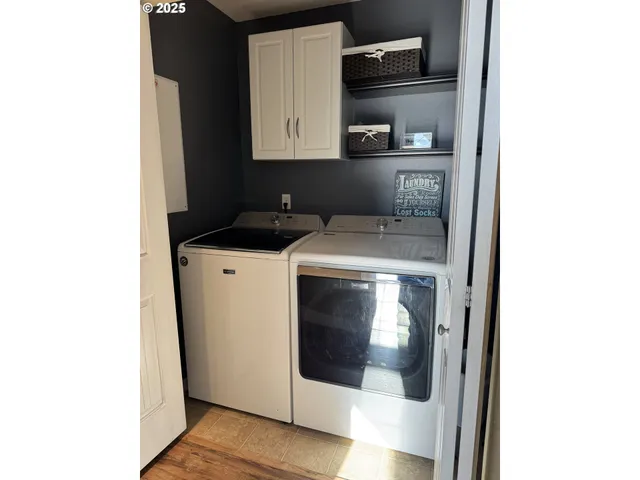 a kitchen with a stove and a microwave