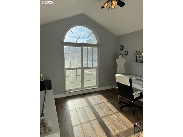 a view of livingroom with furniture and window