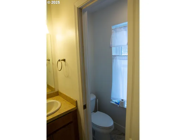 a bathroom with a sink and a toilet