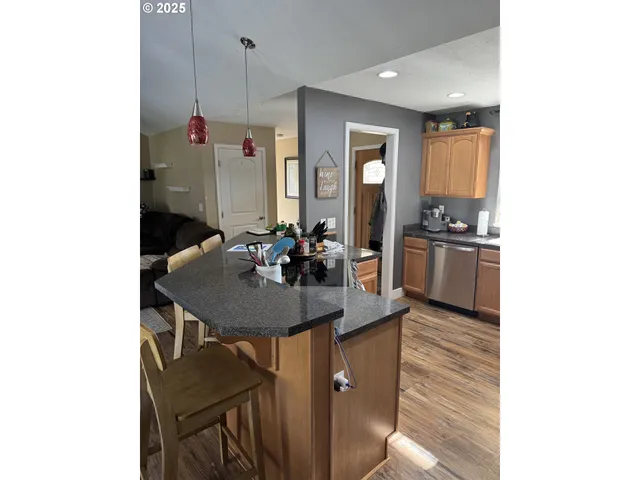 a room that has a sink and a chair in it