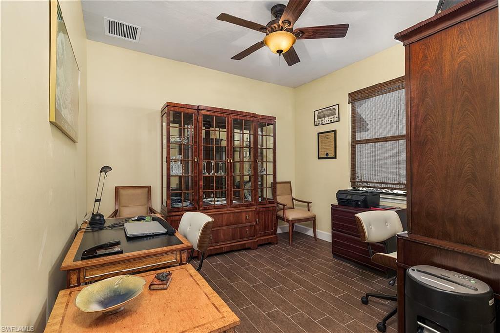 16309 Winfield Lane Naples, FL 34110 - Photo 19 of 35 a bedroom with furniture and a window