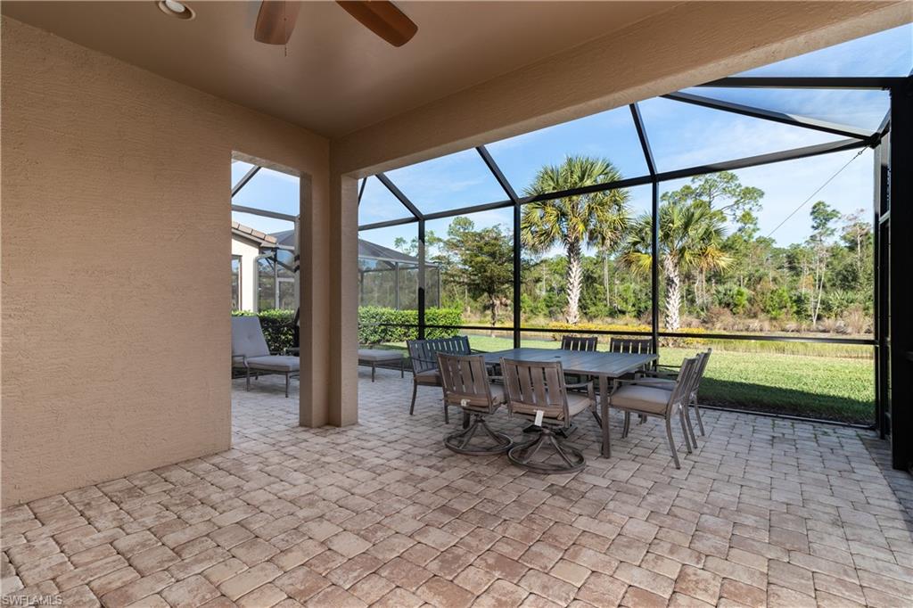 16309 Winfield Lane Naples, FL 34110 - Photo 20 of 35 a view of a city from a dining room with furniture window and outside view