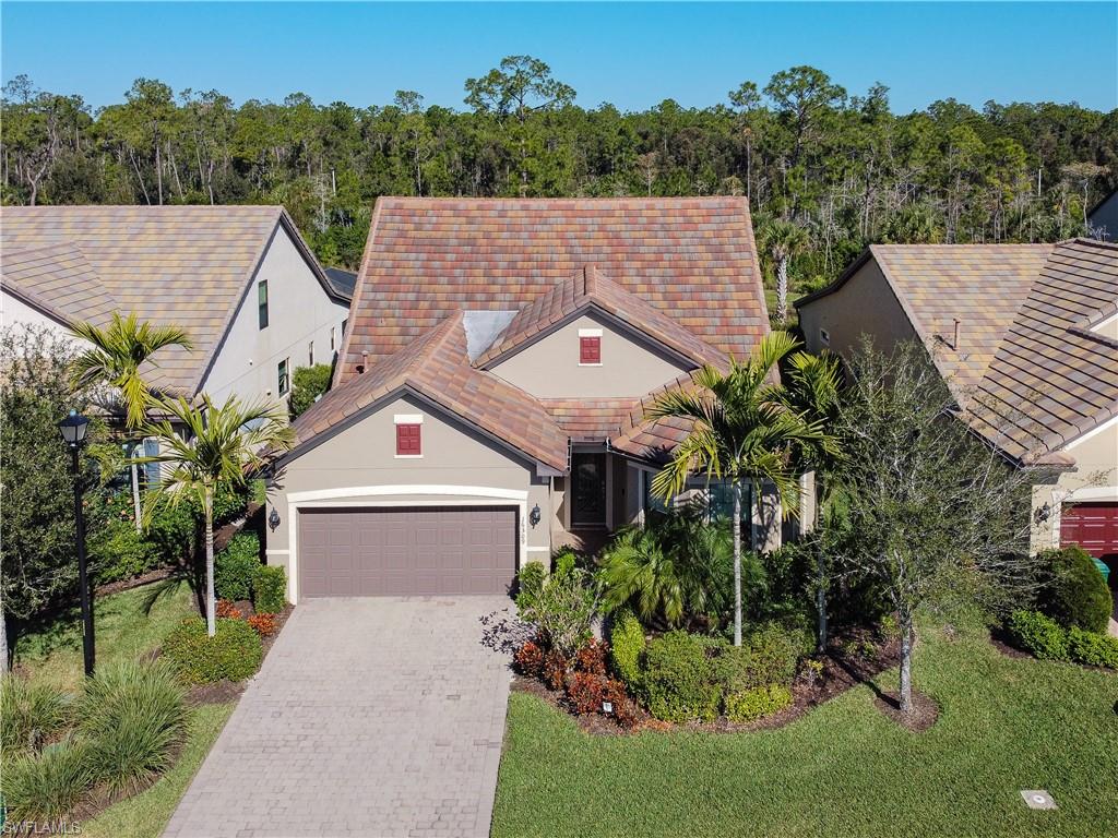 16309 Winfield Lane Naples, FL 34110 - Photo 2 of 35 an aerial view of a house next to a yard