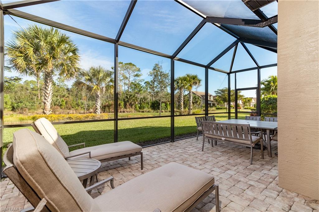 16309 Winfield Lane Naples, FL 34110 - Photo 21 of 35 a view of a bench in the patio