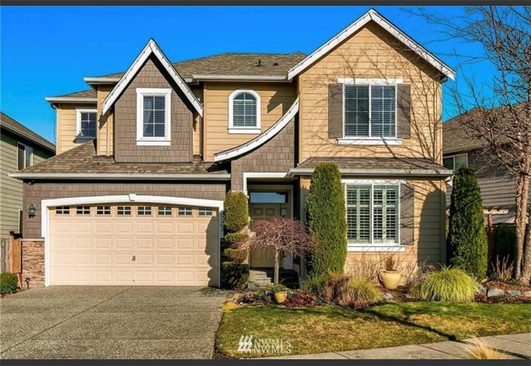 3723 166th Street Southeast Bothell, WA 98012 - Photo 1 of 1 a front view of a house with garden