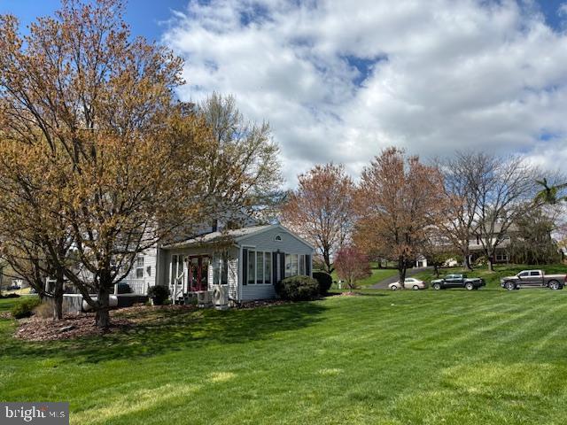 123 Tracy Berg Road Lancaster, PA 17603 - Photo 21 of 27 a front view of a house with garden