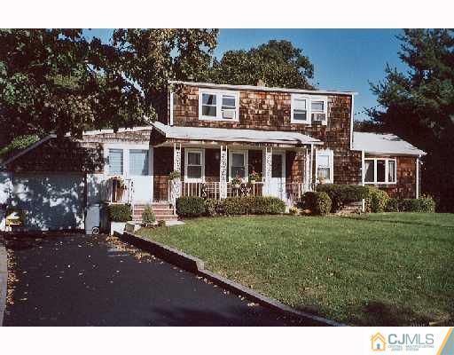 113 New Brooklyn Road Edison, NJ 08817 - Photo 1 of 8 a view of a yard in front of house