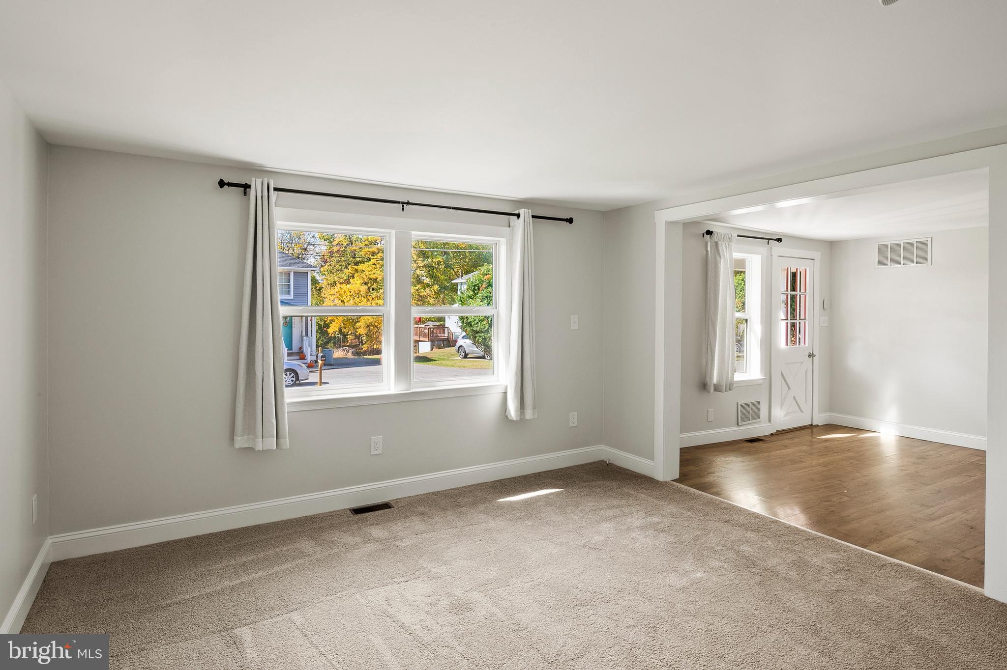 2201 Alvin Avenue Baltimore, MD 21228 - Photo 13 of 39 an empty room with windows and closet