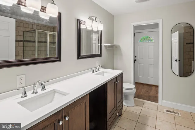 a bathroom with a sink and a toilet
