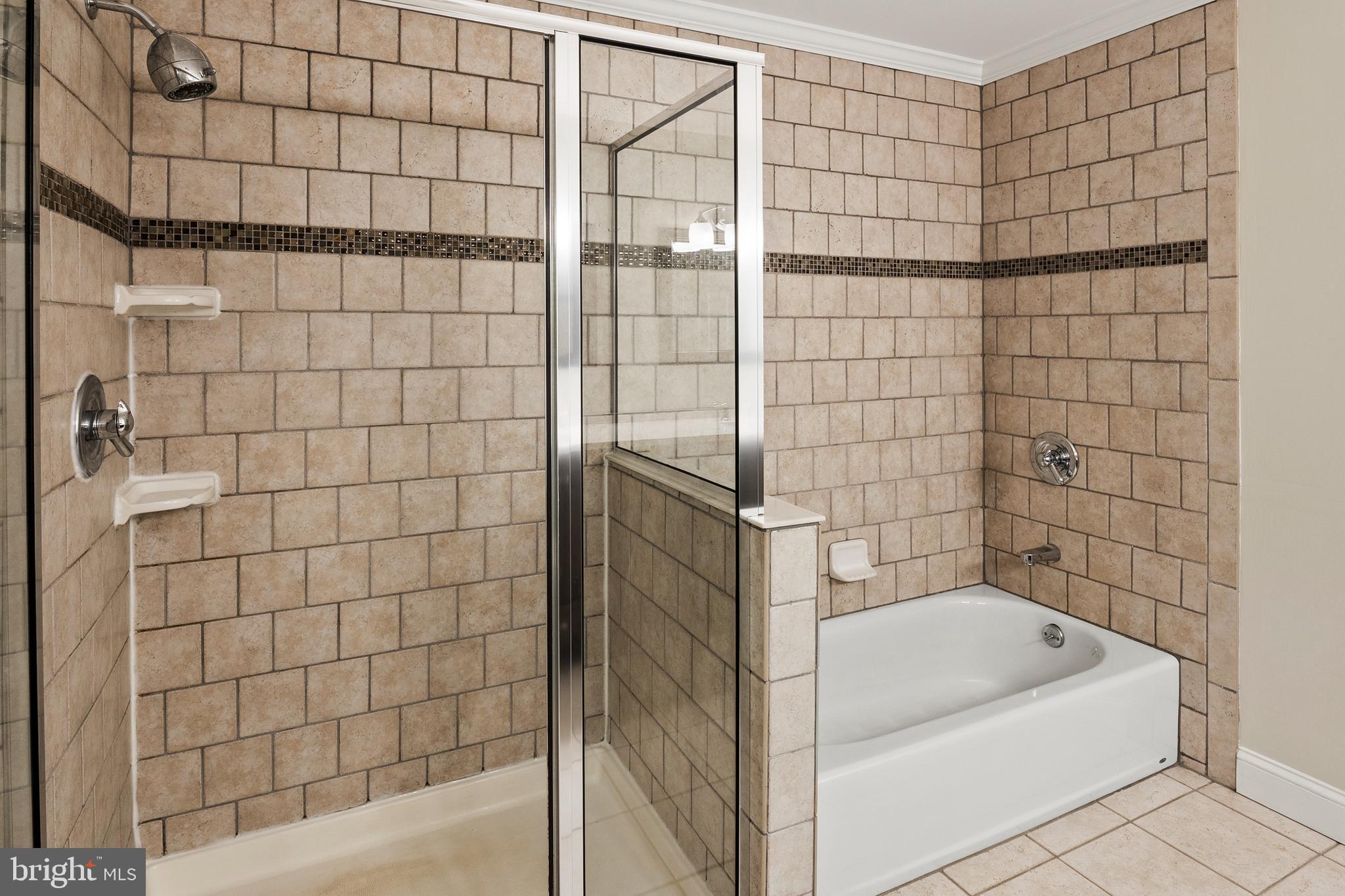 2201 Alvin Avenue Baltimore, MD 21228 - Photo 21 of 39 a bathroom with a bathtub