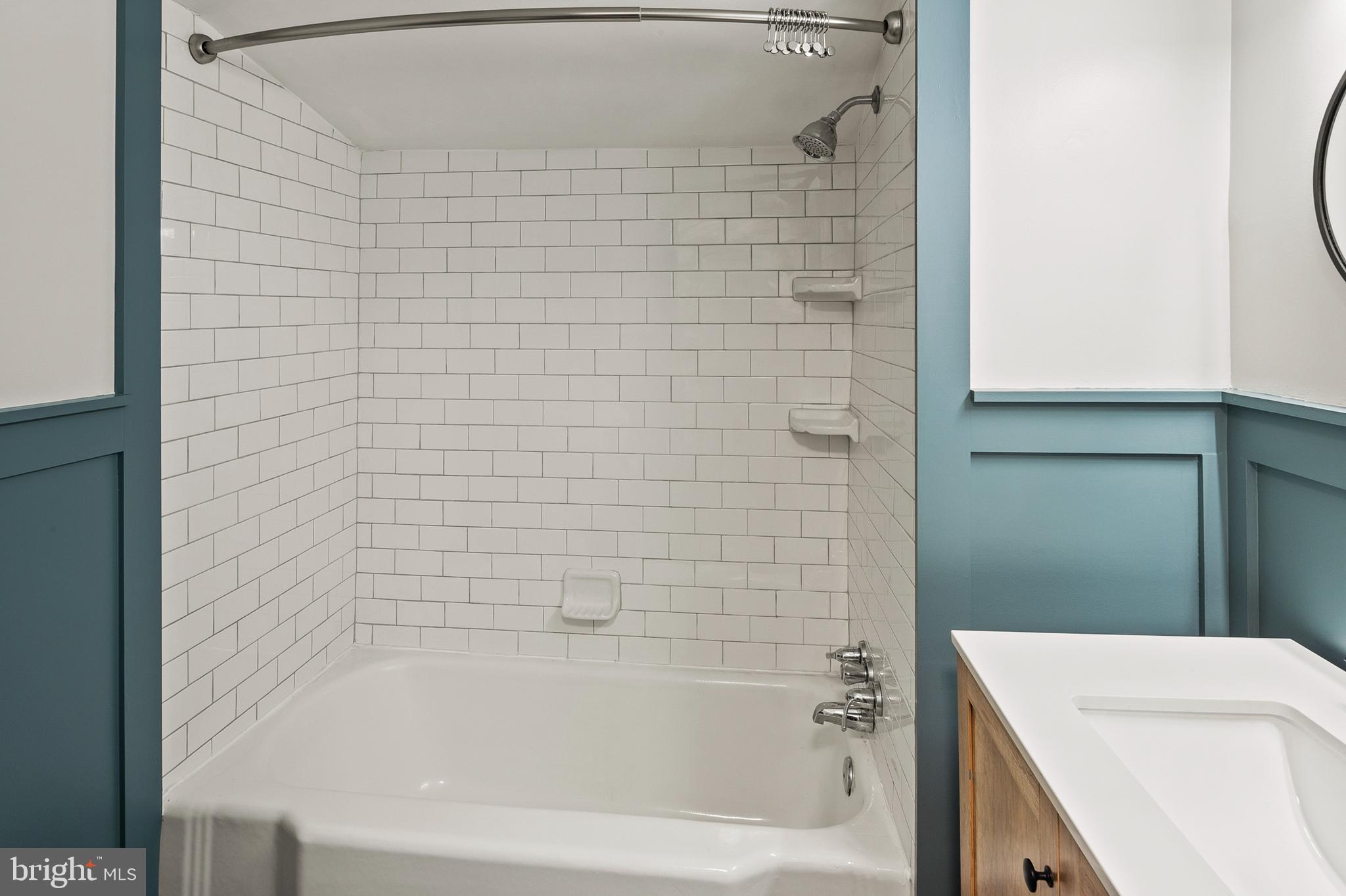 2201 Alvin Avenue Baltimore, MD 21228 - Photo 28 of 39 a bathroom with a bathtub and sink