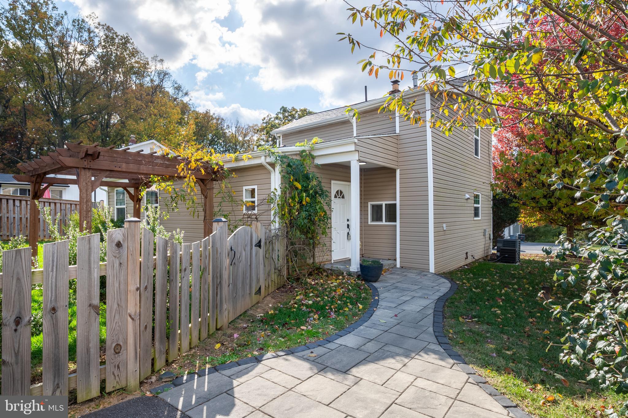 2201 Alvin Avenue Baltimore, MD 21228 - Photo 30 of 39 a front view of a house with a yard