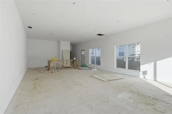 a view of livingroom with furniture and natural light