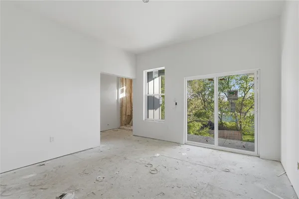 an empty room with windows