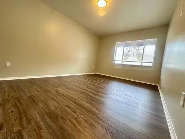 a bathroom with a sink a toilet and bathtub