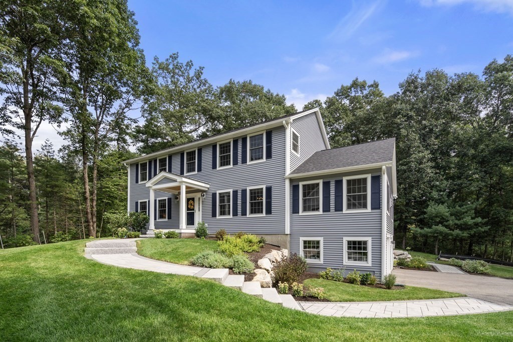 11 Fort Pond Road Acton, MA 01720 - Photo 1 of 40 front view of a house with a yard