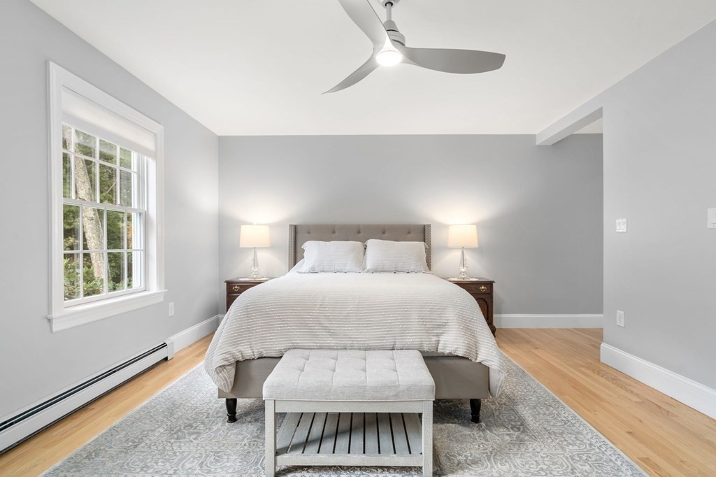 11 Fort Pond Road Acton, MA 01720 - Photo 17 of 40 a bedroom with a bed and window